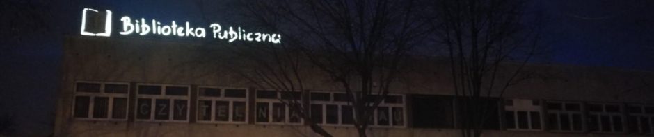 Biblioteka zimą ze świecącym neonem